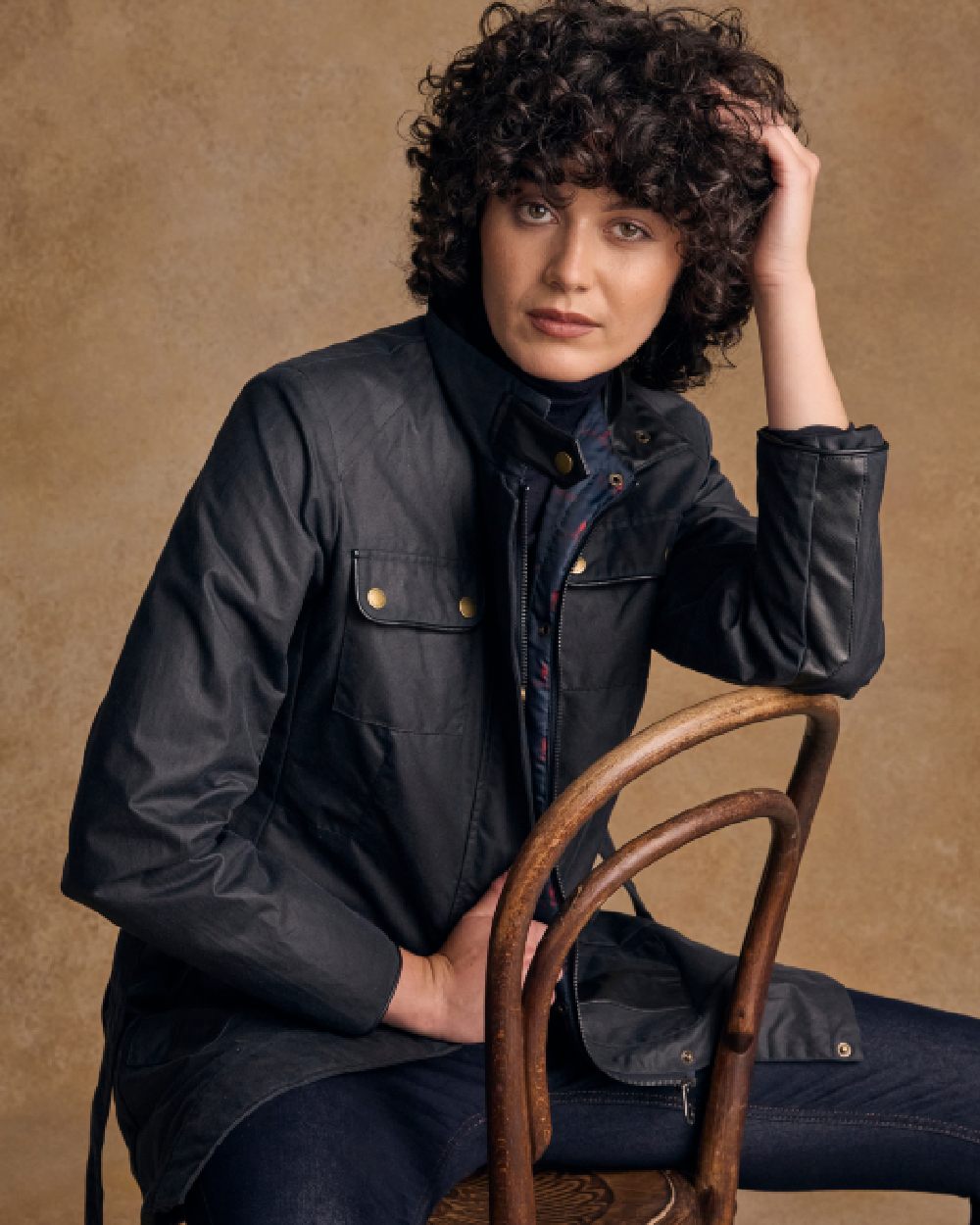 Navy Coloured Jack Murphy Womens Orla Wax Jacket on indoor background 
