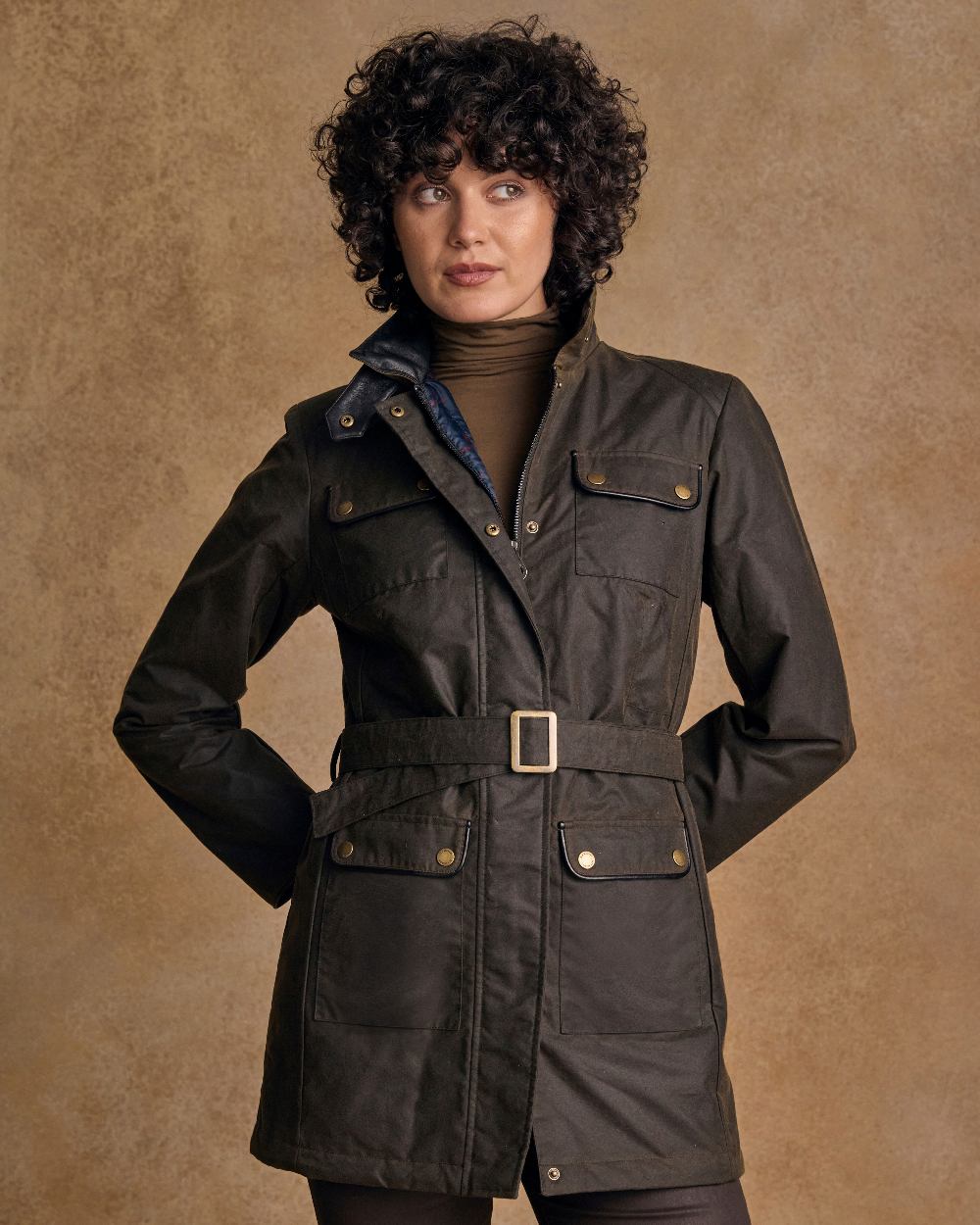 Olive Coloured Jack Murphy Womens Orla Wax Jacket on indoor background 