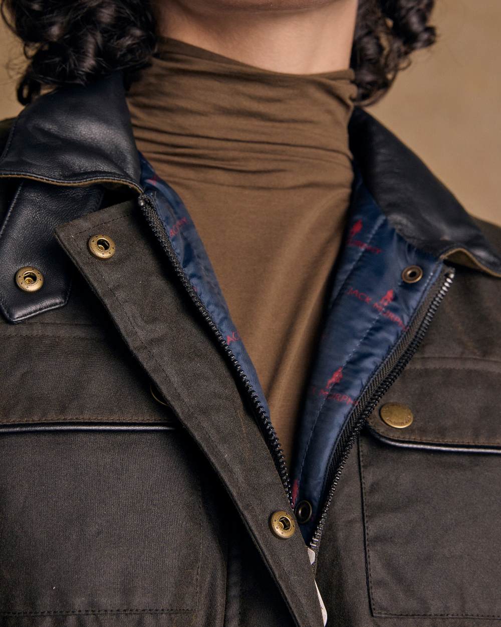 Olive Coloured Jack Murphy Womens Orla Wax Jacket on indoor background 