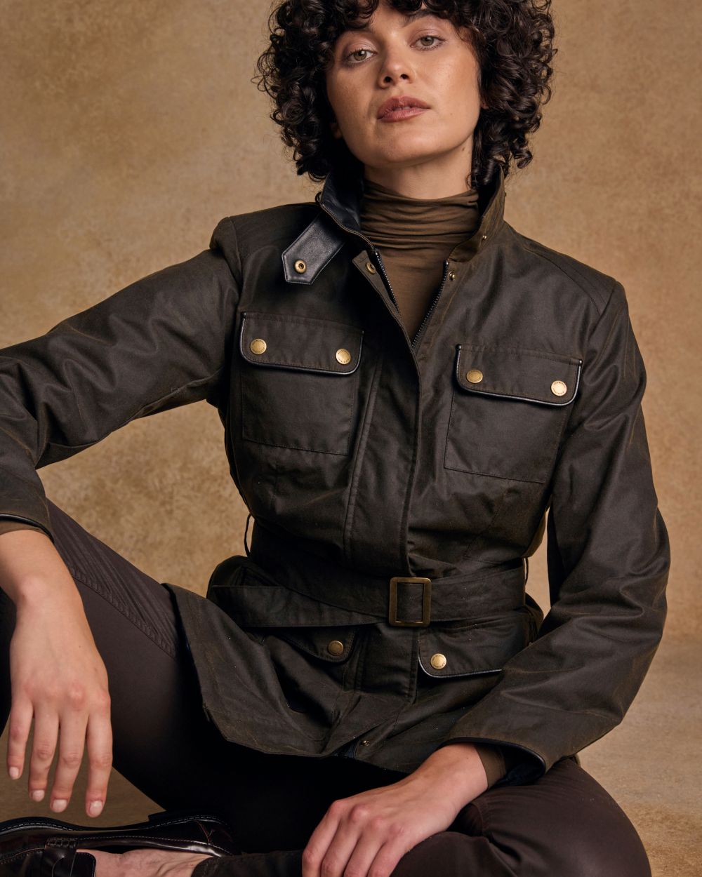 Olive Coloured Jack Murphy Womens Orla Wax Jacket on indoor background 