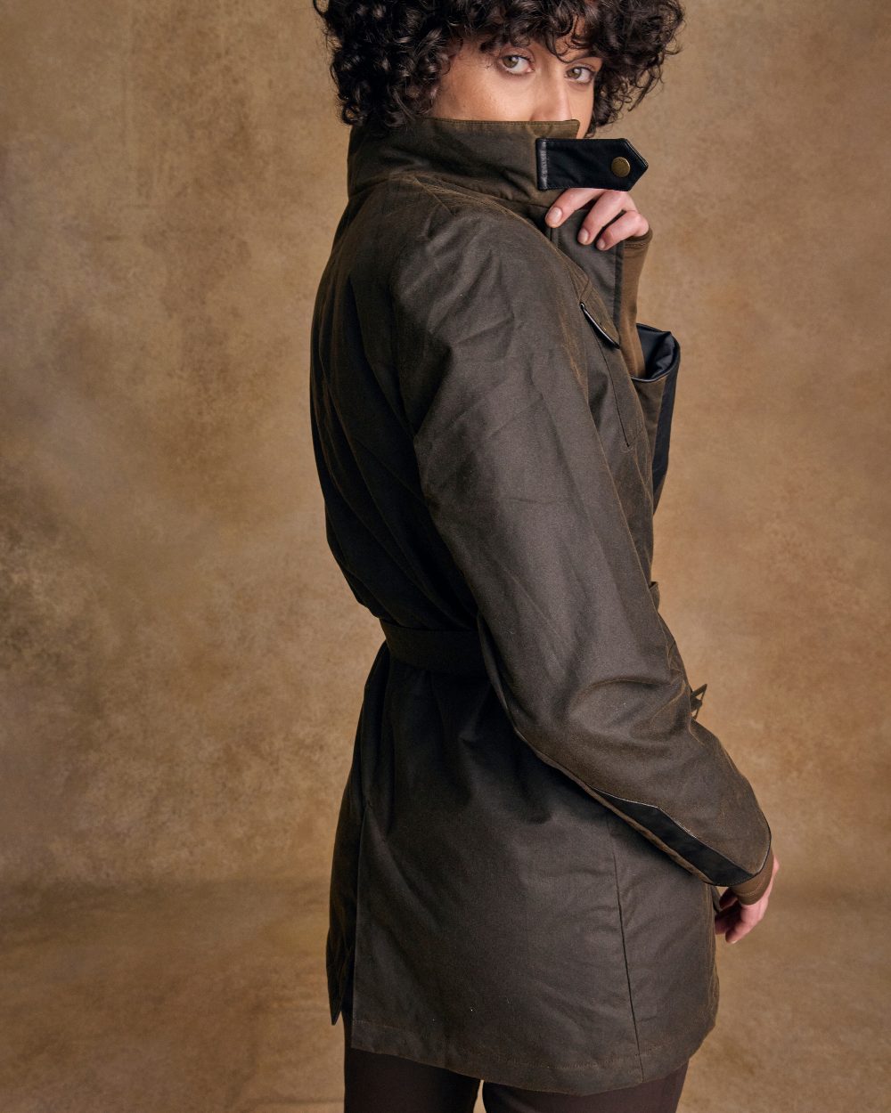 Olive Coloured Jack Murphy Womens Orla Wax Jacket on indoor background 