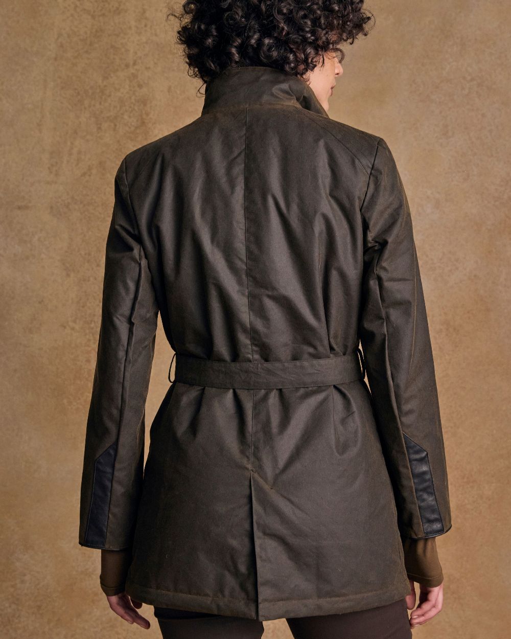 Olive Coloured Jack Murphy Womens Orla Wax Jacket on indoor background 