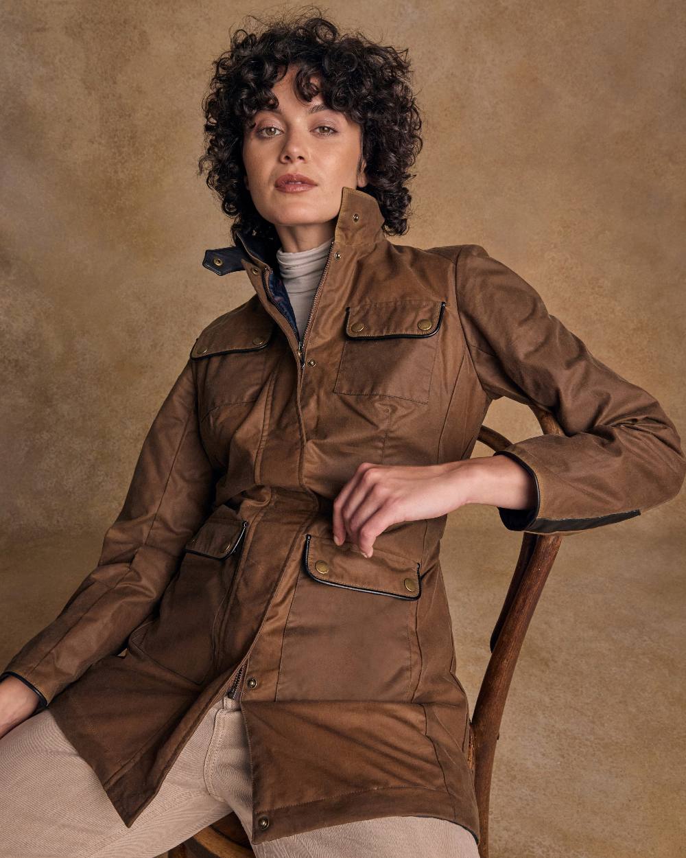 Tan Coloured Jack Murphy Womens Orla Wax Jacket on indoor background 