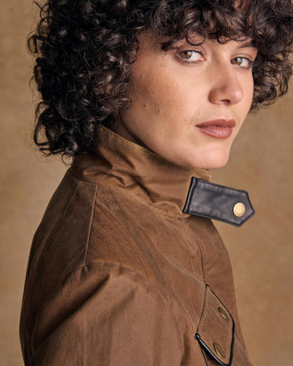 Tan Coloured Jack Murphy Womens Orla Wax Jacket on indoor background 