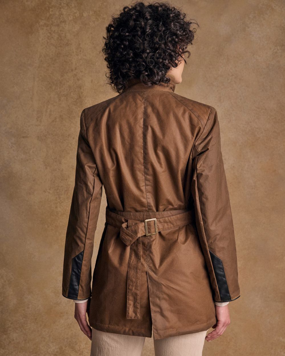 Tan Coloured Jack Murphy Womens Orla Wax Jacket on indoor background 