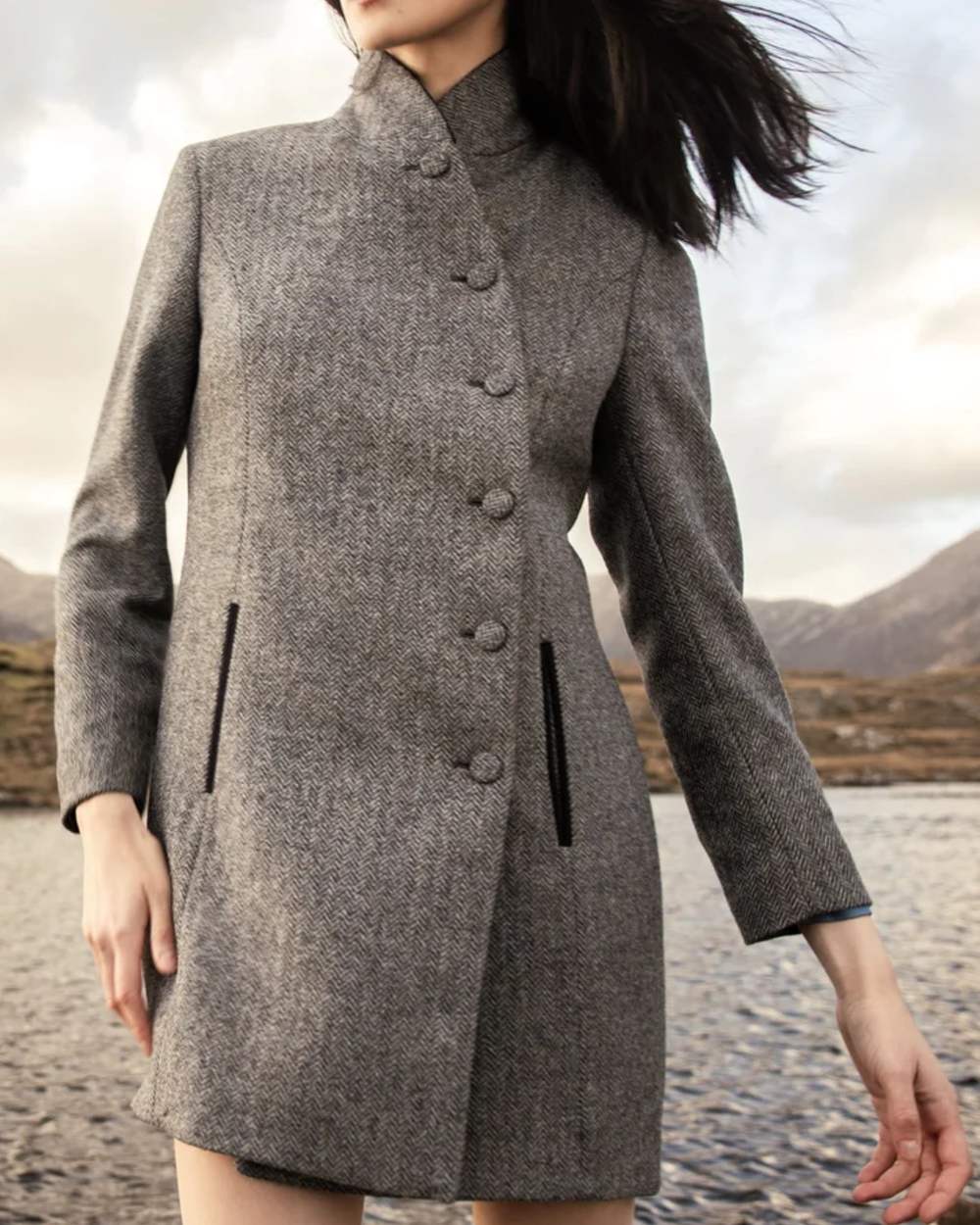Denim Herringbone coloured Jack Murphy Womens Robin Tweed Coat on sea background 