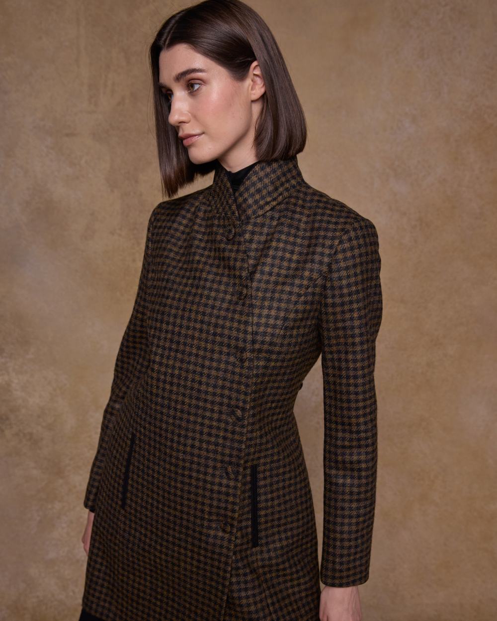 Earth Check coloured Jack Murphy Womens Robin Tweed Coat on textured background 