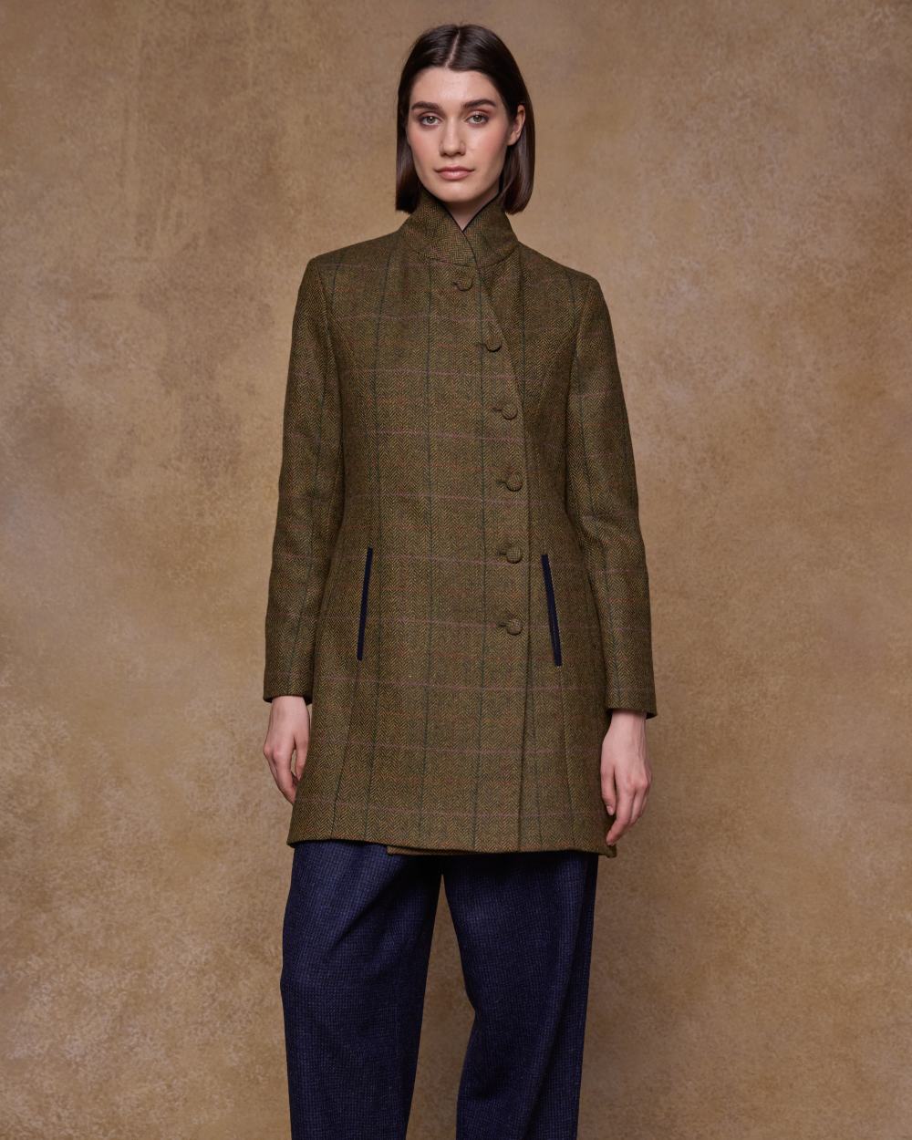 Woodland Check coloured Jack Murphy Womens Robin Tweed Coat on textured background 
