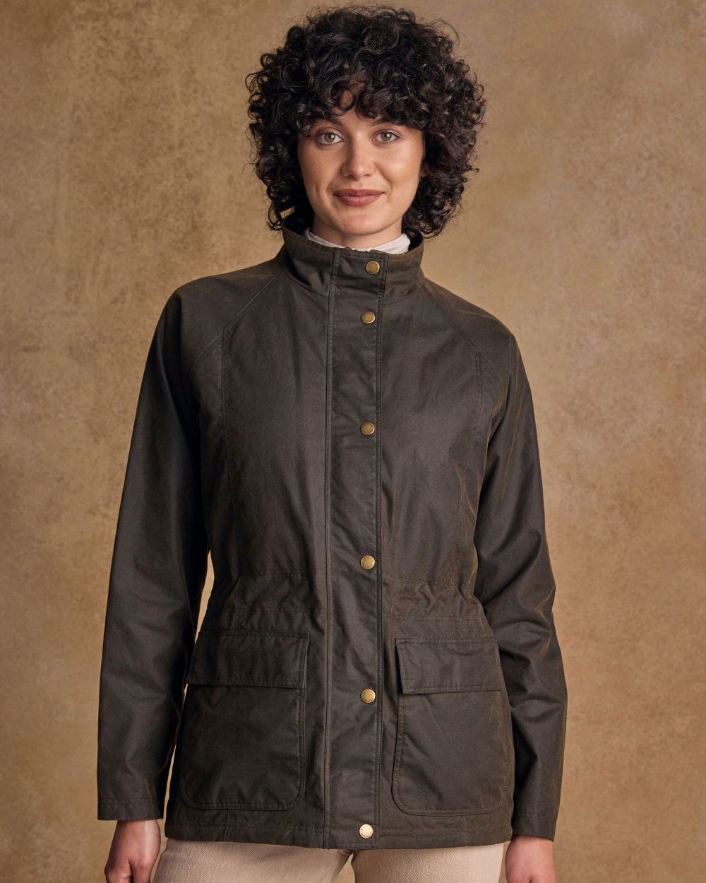 Olive Coloured Jack Murphy Womens Sally Wax Jacket on indoor background 