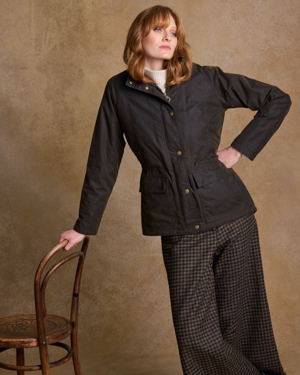 Olive Coloured Jack Murphy Womens Sally Wax Jacket on indoor background 