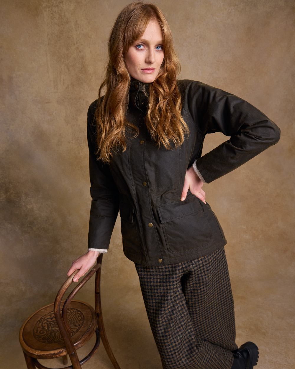 Olive Coloured Jack Murphy Womens Sally Wax Jacket on indoor background 