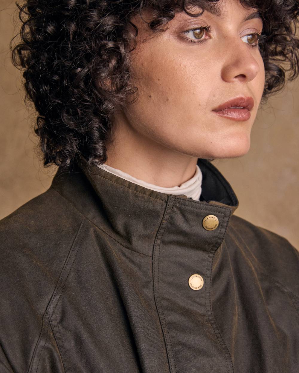 Olive Coloured Jack Murphy Womens Sally Wax Jacket on indoor background 