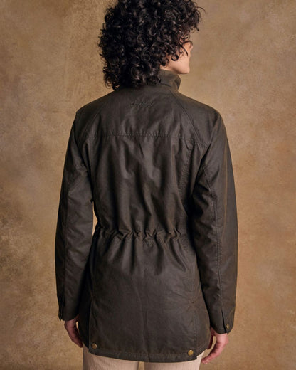 Olive Coloured Jack Murphy Womens Sally Wax Jacket on indoor background 