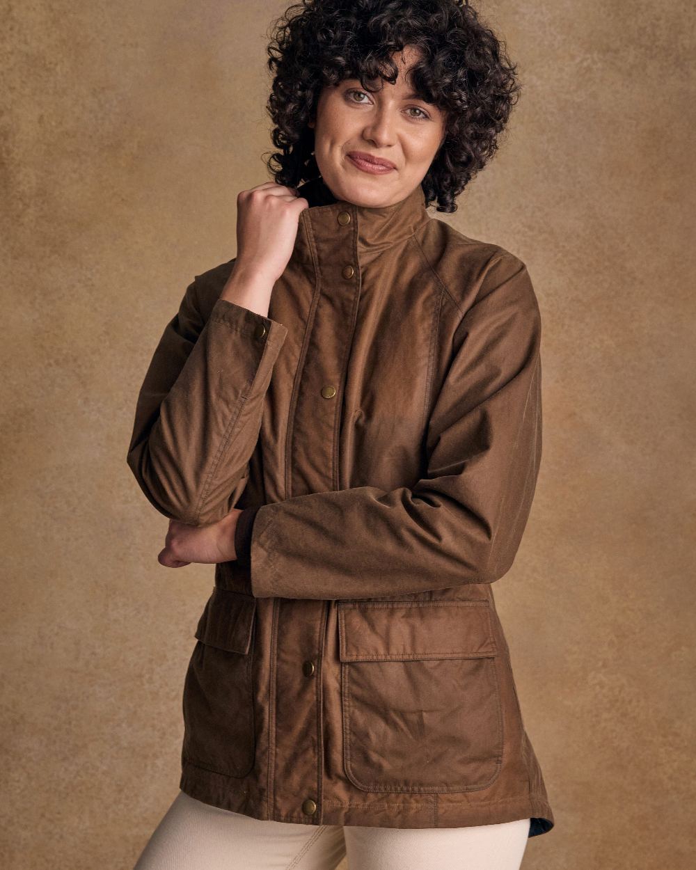 Tan Coloured Jack Murphy Womens Sally Wax Jacket on indoor background 