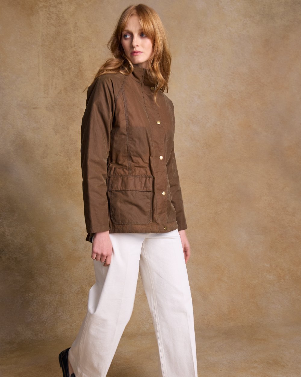 Tan Coloured Jack Murphy Womens Sally Wax Jacket on indoor background 