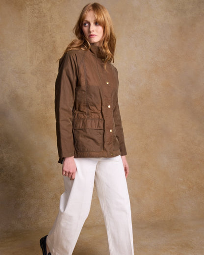 Tan Coloured Jack Murphy Womens Sally Wax Jacket on indoor background 