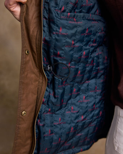 Tan Coloured Jack Murphy Womens Sally Wax Jacket on indoor background 