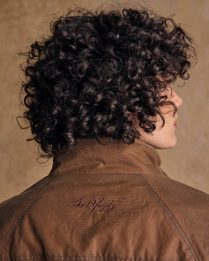 Tan Coloured Jack Murphy Womens Sally Wax Jacket on indoor background 