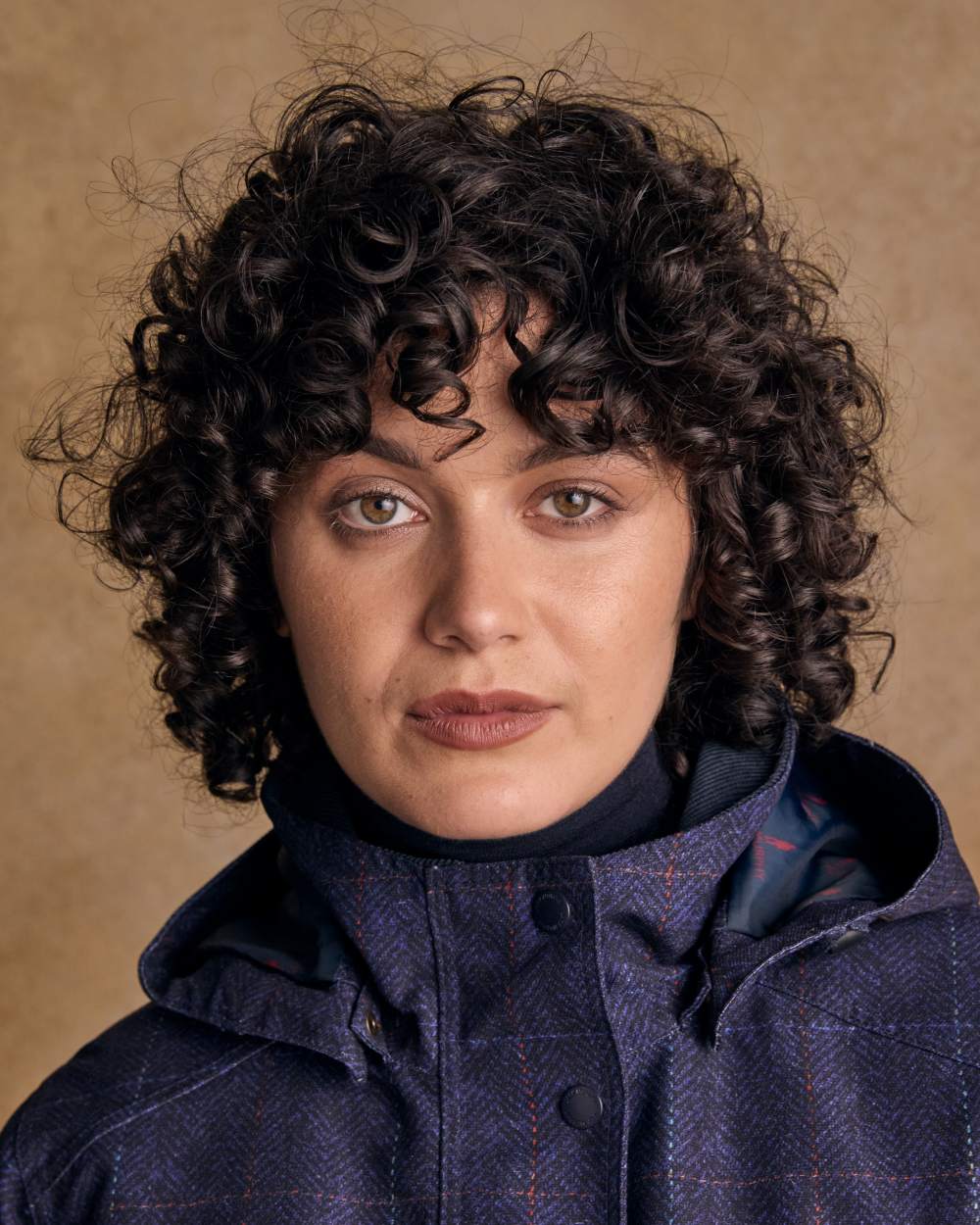 Navy Windowpane Digital Print coloured Jack Murphy Womens Sophia Waterproof Jacket on textured background 