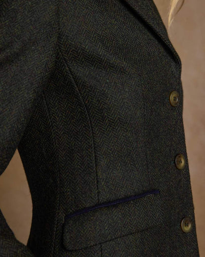Deep Green Herringbone coloured Jack Murphy Womens Tara Tweed Hacking Jacket on textured 