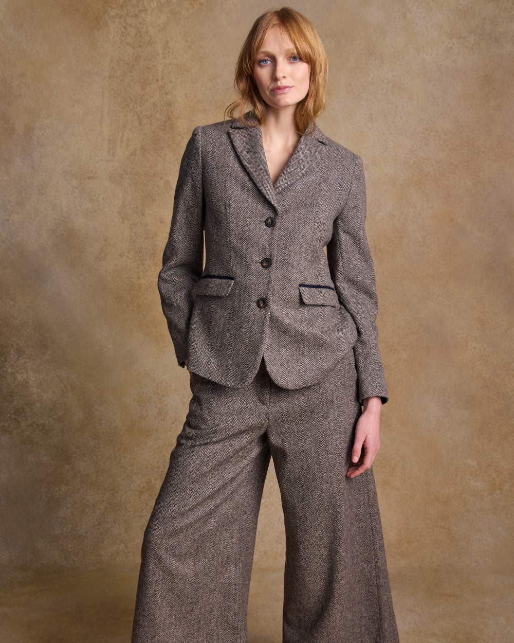 Light Tan Herringbone coloured Jack Murphy Womens Tara Tweed Hacking Jacket on textured 