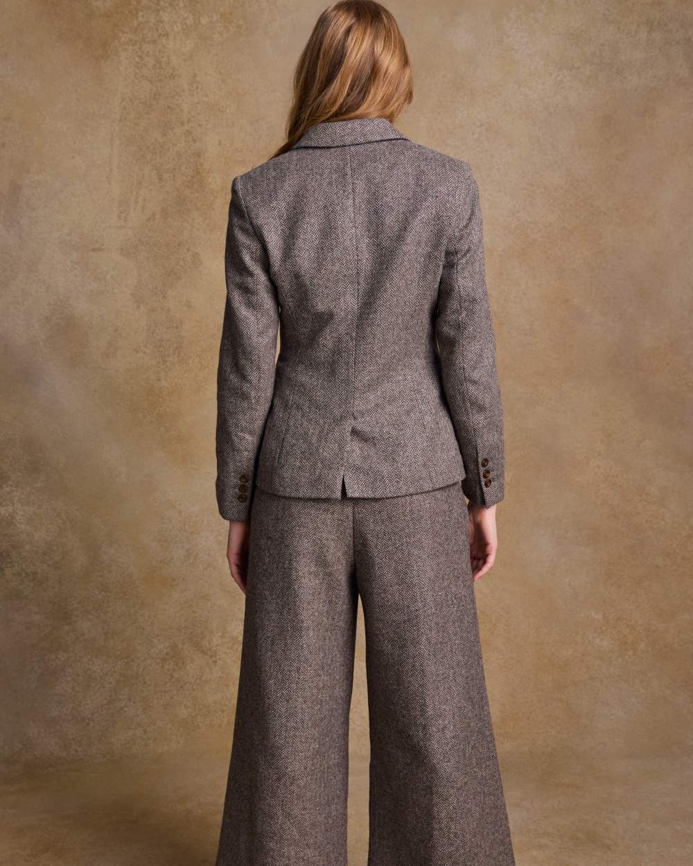 Light Tan Herringbone coloured Jack Murphy Womens Tara Tweed Hacking Jacket on textured 