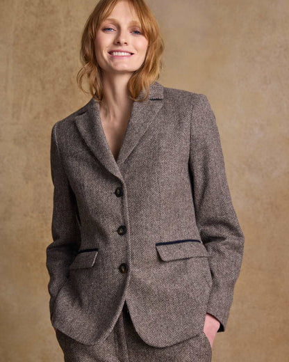 Light Tan Herringbone coloured Jack Murphy Womens Tara Tweed Hacking Jacket on textured 