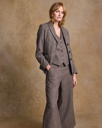 Light Tan Herringbone coloured Jack Murphy Womens Tara Tweed Hacking Jacket on textured 