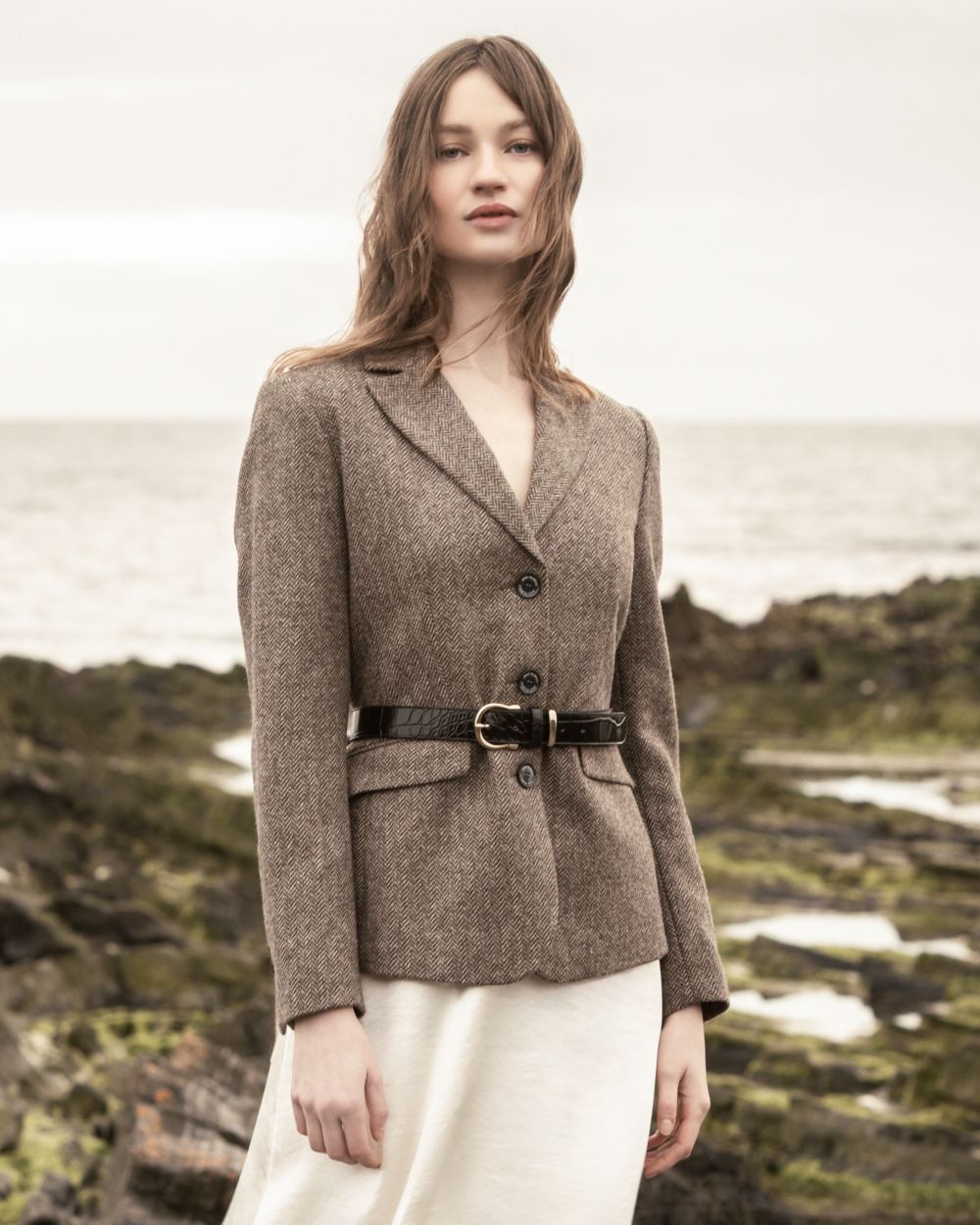 Light Tan Herringbone coloured Jack Murphy Womens Tara Tweed Hacking Jacket on sea 