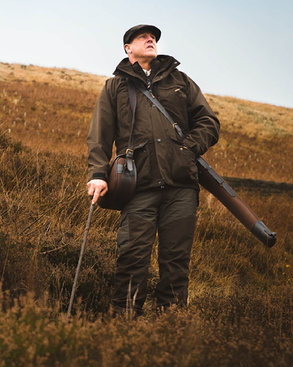 Olive coloured Jack Pyke Ashcombe Jacket on grassy background 