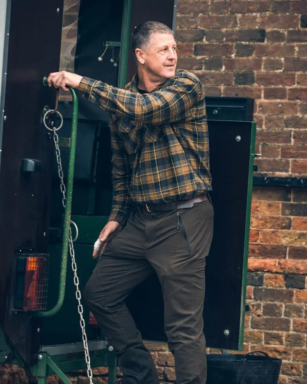 Brown coloured Jack Pyke Flannel Shirt on Van background 