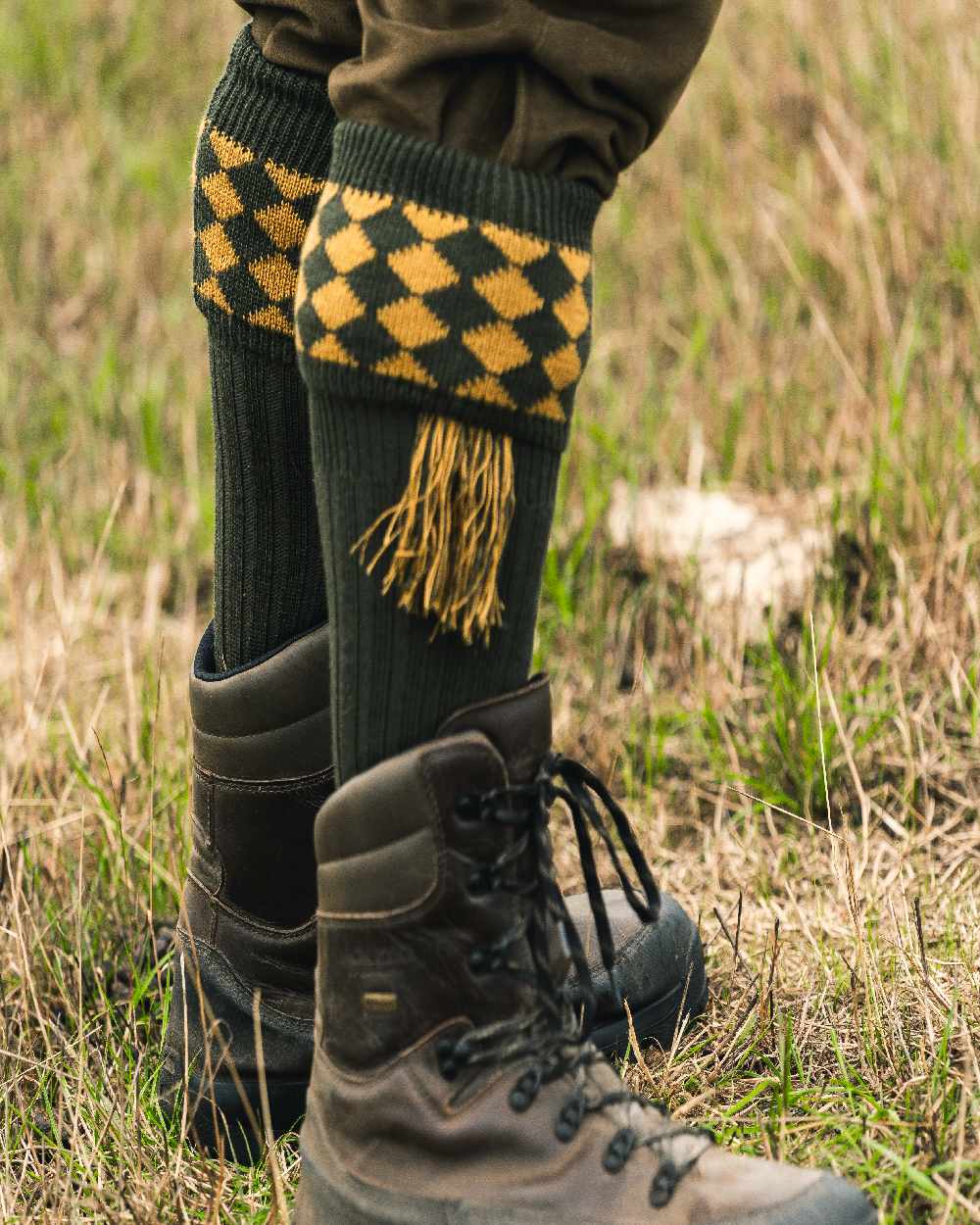 Green Coloured Jack Pyke Harlequin Socks on outdoor background 