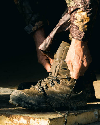 Brown coloured Jack Pyke Hunters Boots on outdoor background 