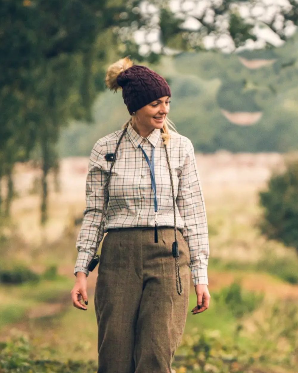 Navy coloured Jack Pyke Ladies Countryman Shirt on blurry background 