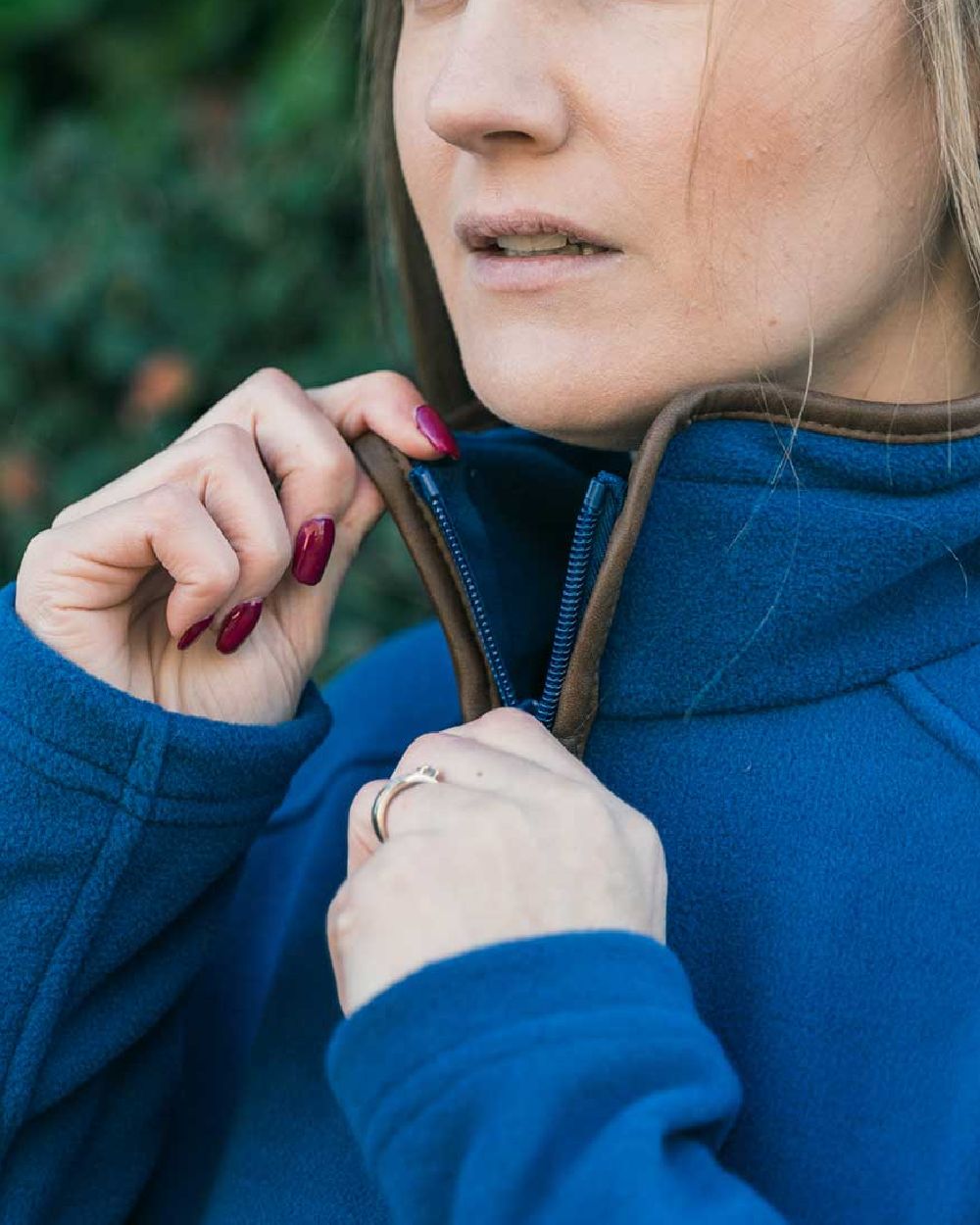 Denim coloured Jack Pyke Ladies Fleece Jacket on blurry background 