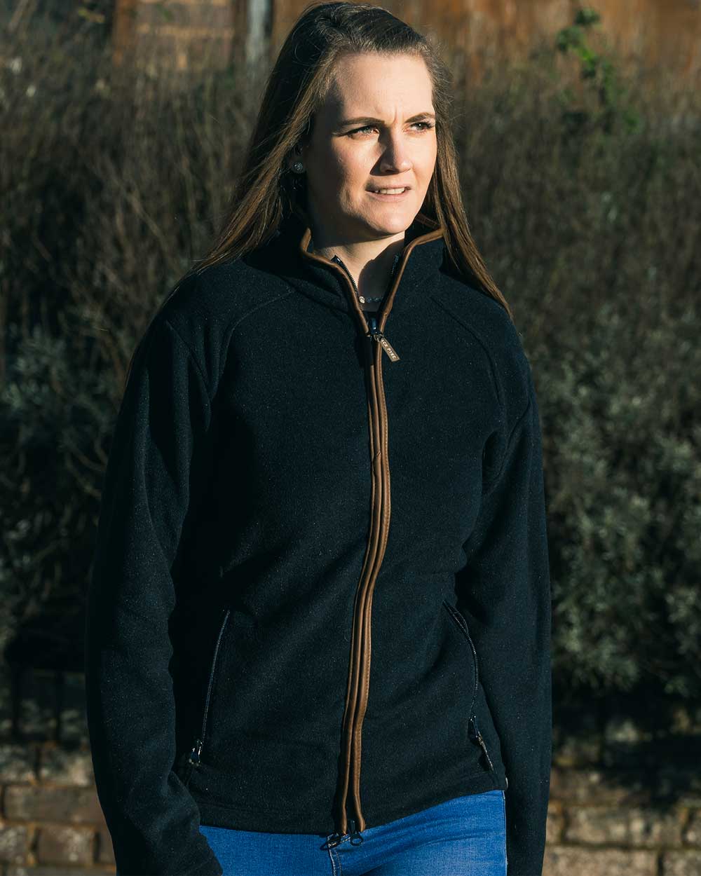 Navy coloured Jack Pyke Ladies Fleece Jacket on tree background 