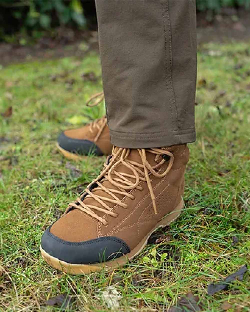 Brown coloured Jack Pyke Lowland Boots on grassy background 