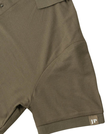 Green coloured Jack Pyke Mens Shires Polo Shirt on white background 