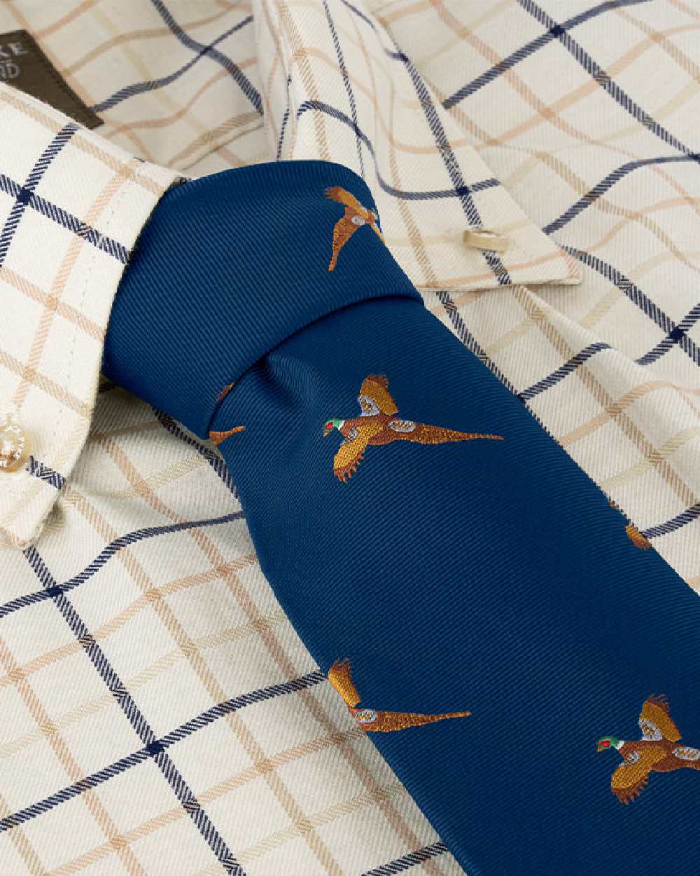 Navy coloured Jack Pyke Shooting Tie Pheasant on white background 