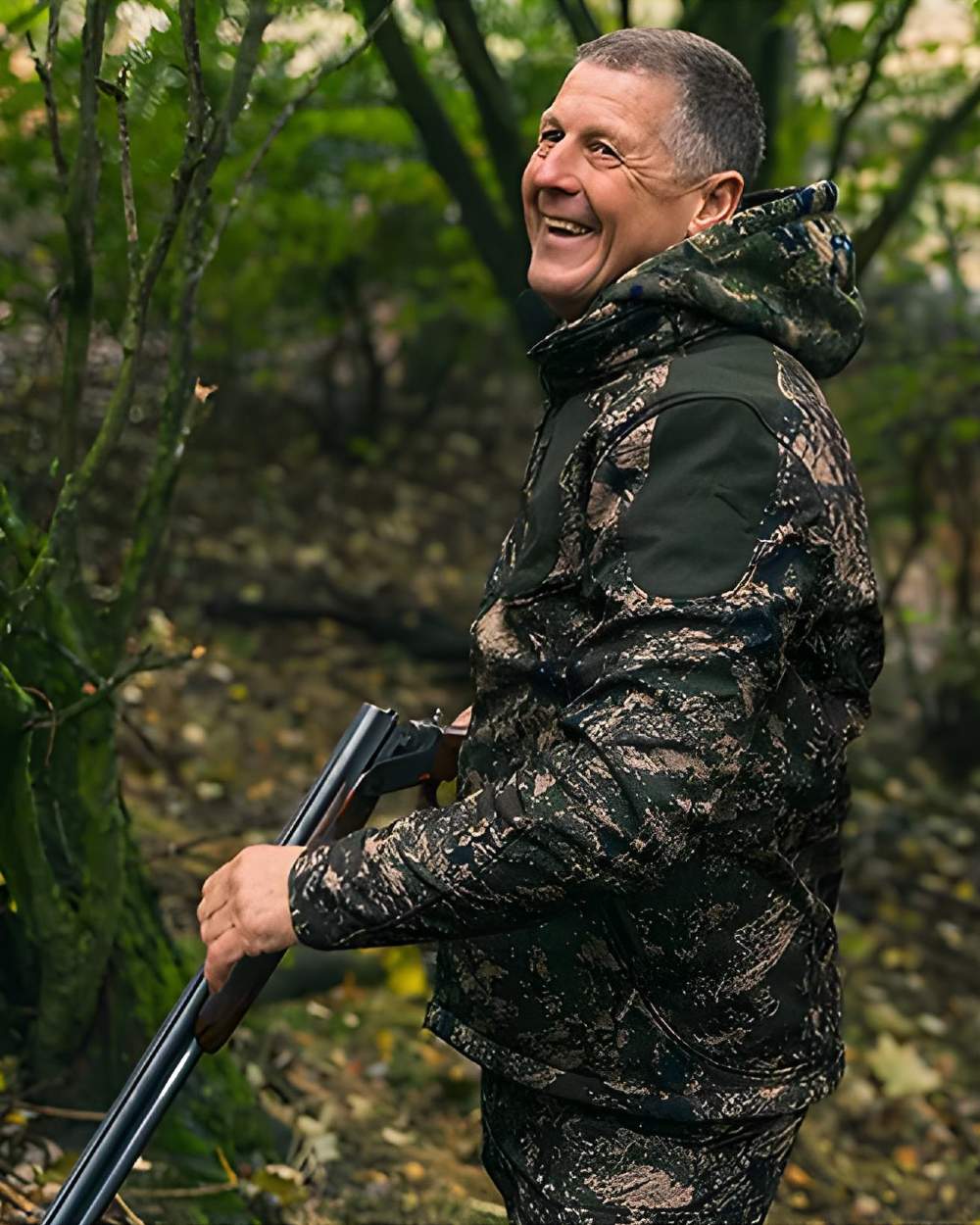 Digicam coloured Jack Pyke Softshell Jacket on forest background 