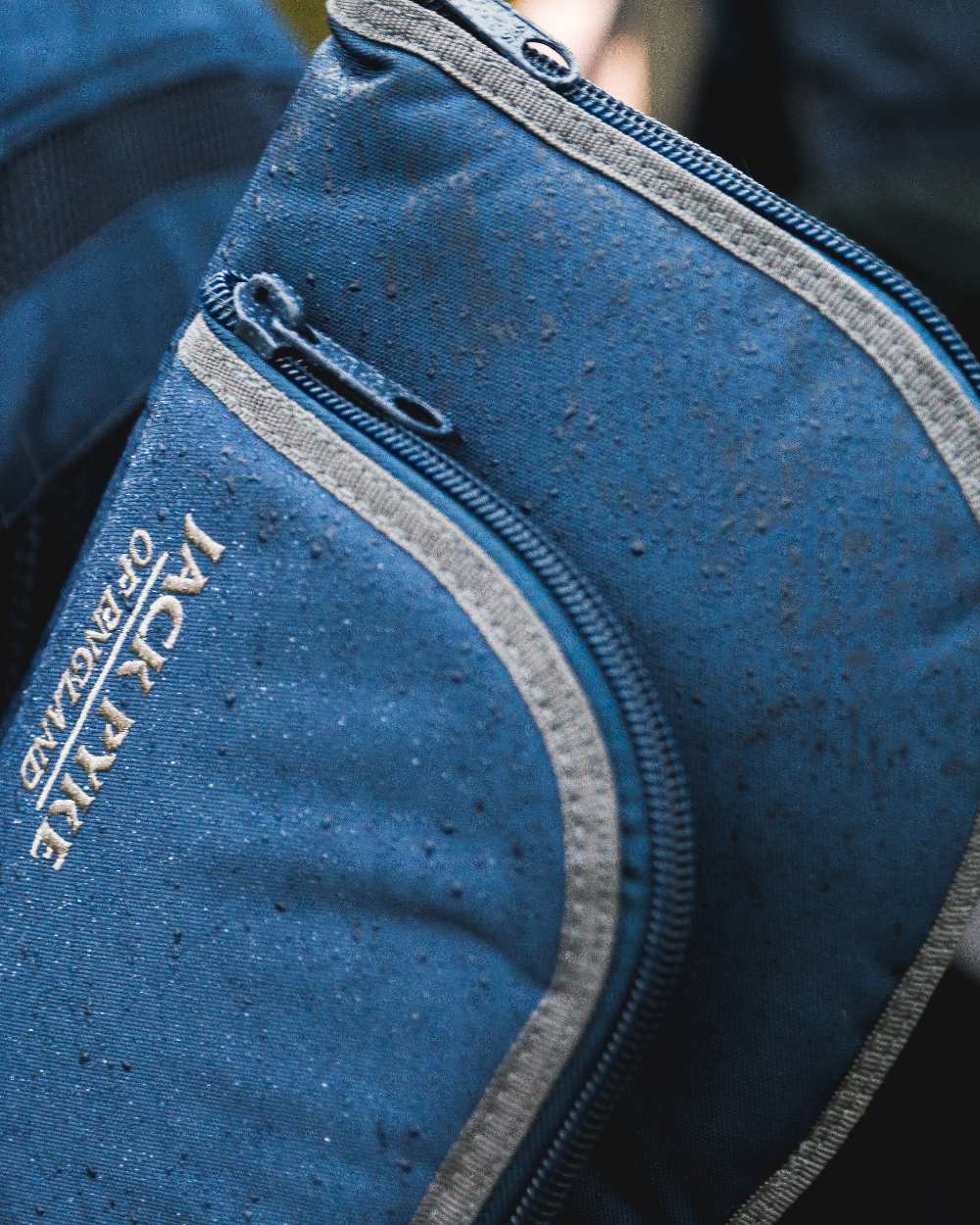 Blue coloured Jack Pyke Sporting Gun Slip on outdoor background 