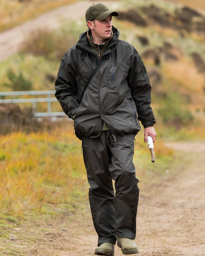 Hunter Green coloured Jack Pyke Technical Featherlite Jacket on mountain background 