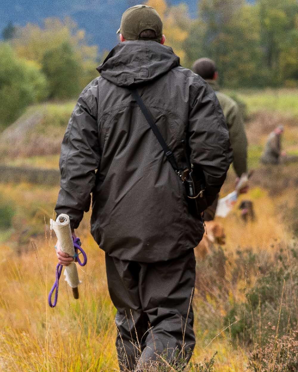 Hunter Green coloured Jack Pyke Technical Featherlite Jacket on mountain background 
