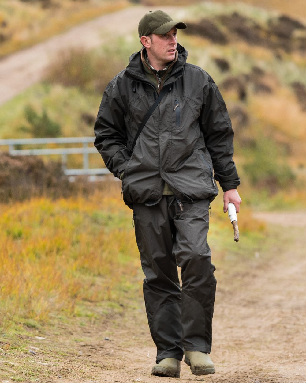 Hunters Green coloured Jack Pyke Technical Featherlite Trousers on mountain background 