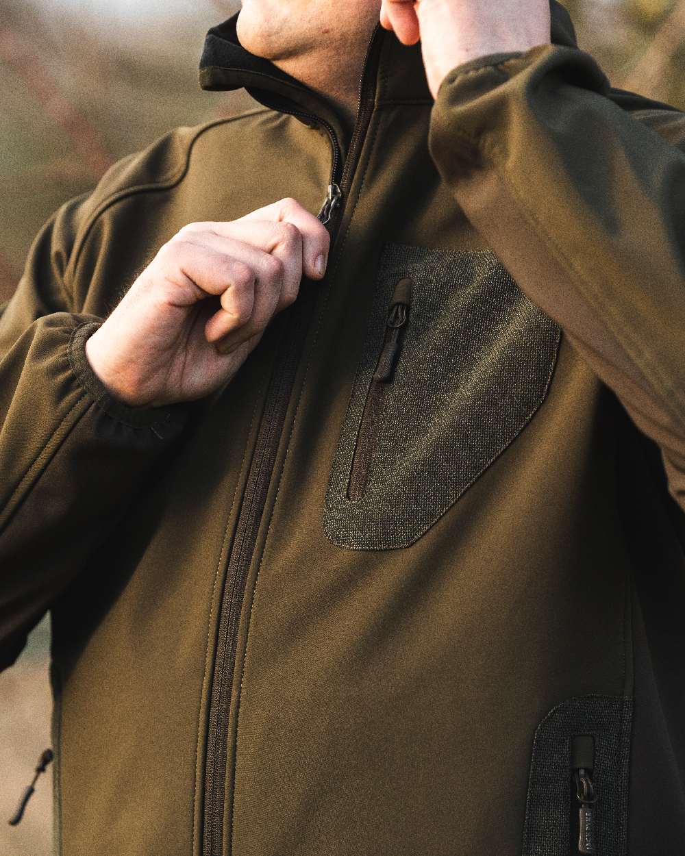Green Coloured Jack Pyke Weardale Softshell Jacket on outdoor background 