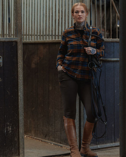 Navy Russet coloured Jack Pyke Womens Bleasdale Heavy Flannel Shirt on outdoor background 