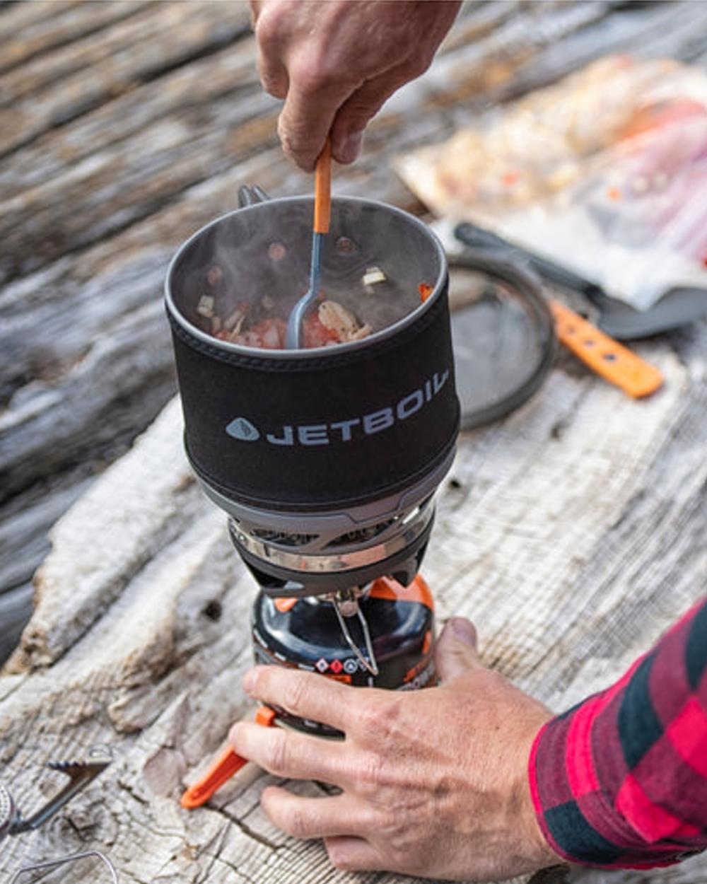 Carbon Coloured Jetboil MiniMo Cooking System on outdoor  background 