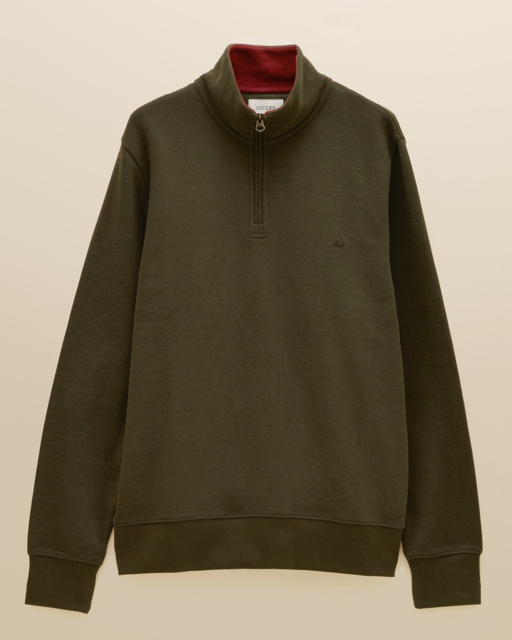 Green coloured Joules Alistair Quarter Zip Cotton Sweatshirt on beige background 