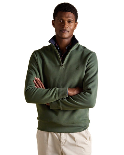 Khaki Green coloured Joules Alistair Quarter Zip Cotton Sweatshirt on white background 