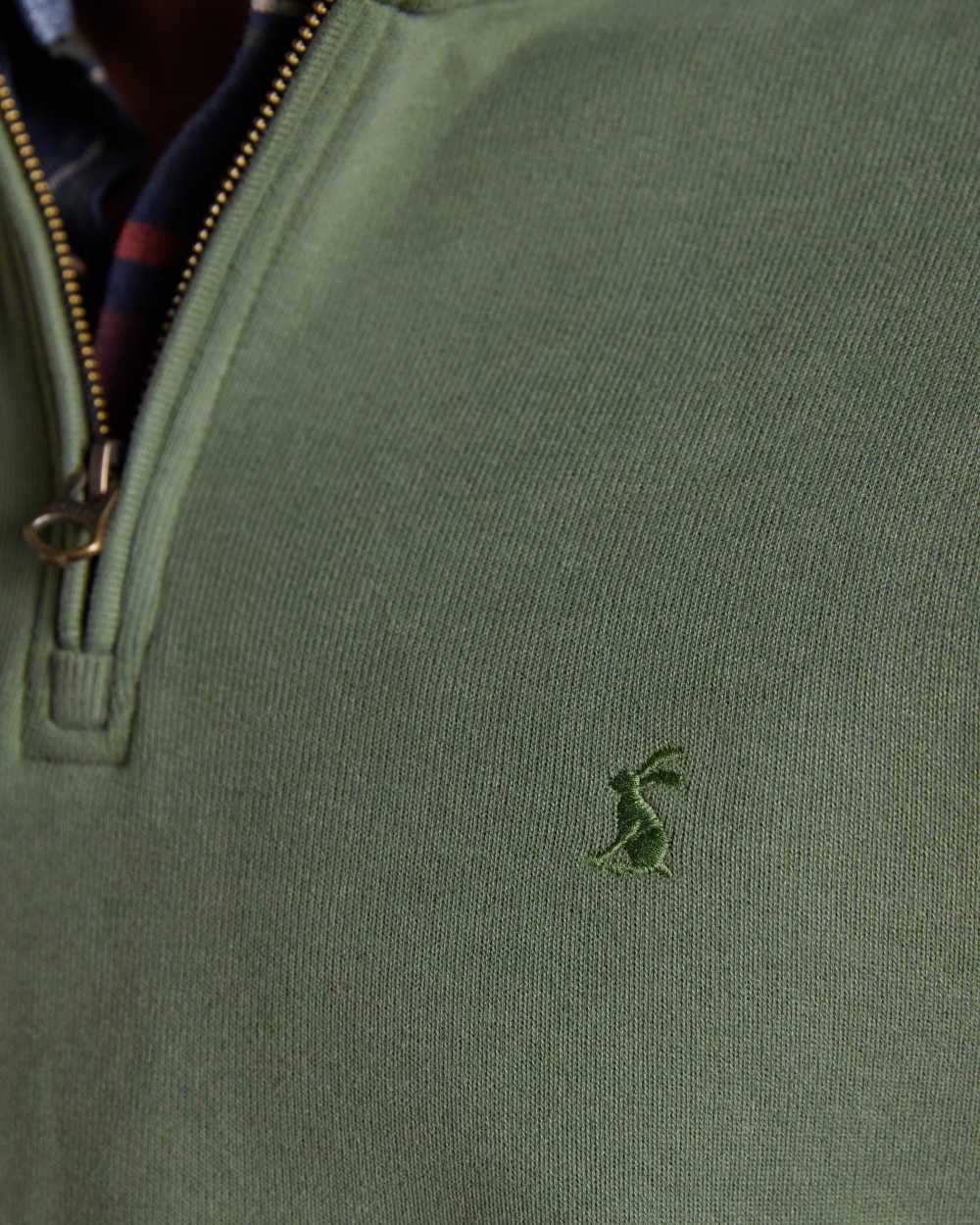 Khaki Green coloured Joules Alistair Quarter Zip Cotton Sweatshirt on white background 